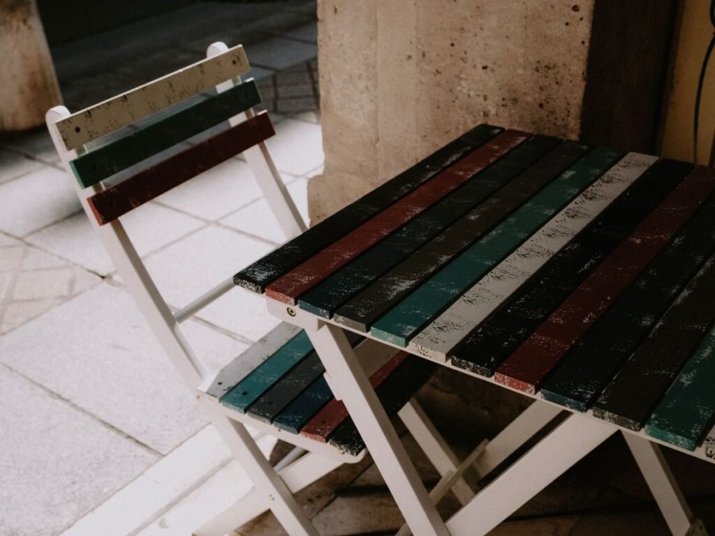 Painted outdoor chairs and table after a DIY furniture makeover